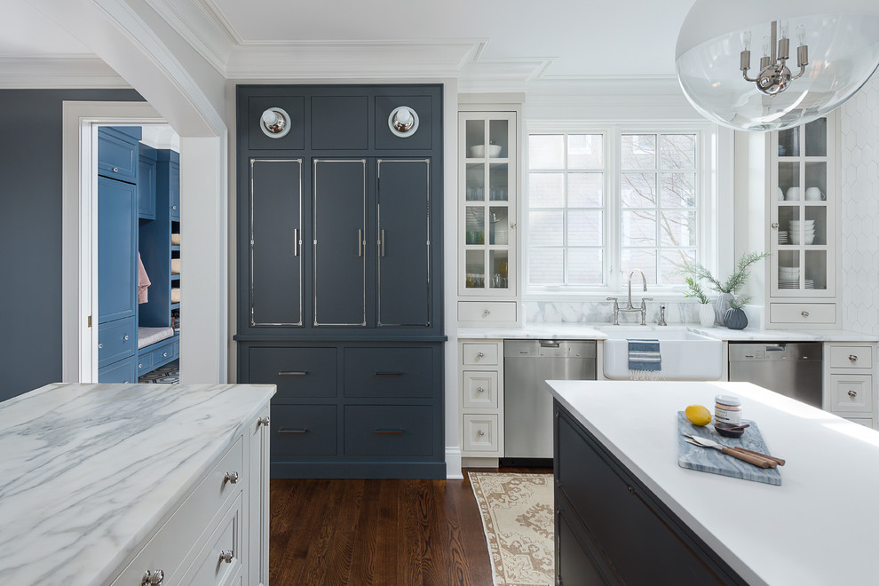Kitchen - large transitional medium tone wood floor and brown floor kitchen idea in Chicago with a farmhouse sink, beaded inset cabinets, blue cabinets, marble countertops, white backsplash, ceramic backsplash, stainless steel appliances, two islands and yellow countertops