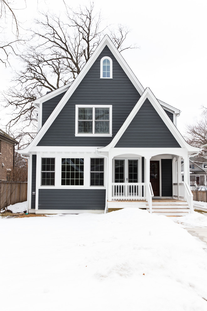 Large transitional blue two-story concrete fiberboard and clapboard gable roof idea in Chicago with a shingle roof and a black roof