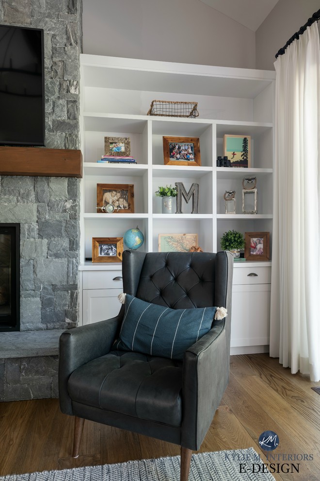 Mid-sized transitional open concept living room in Vancouver with grey walls, medium hardwood floors, a standard fireplace, a stone fireplace surround and a wall-mounted tv.
