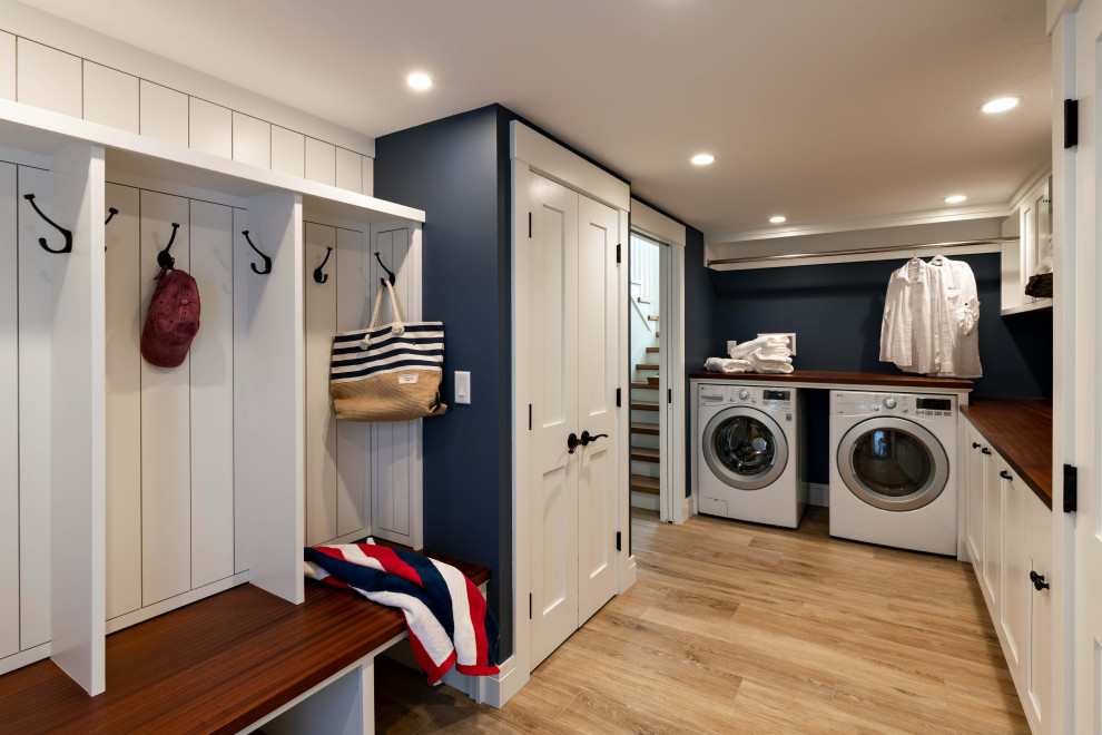 This is an example of a beach style laundry room.