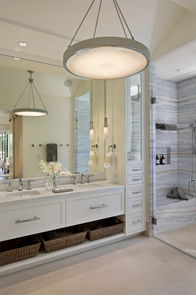 Example of a country master double-sink, marble floor, beige floor and vaulted ceiling alcove shower design in San Francisco with flat-panel cabinets, white cabinets, a built-in vanity, white walls, an undermount sink, marble countertops, a hinged shower door and white countertops