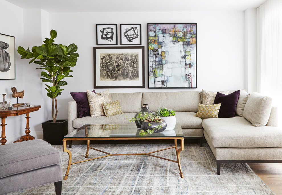 Living room - mid-sized transitional formal and enclosed light wood floor and beige floor living room idea in Toronto with white walls, no fireplace and no tv
