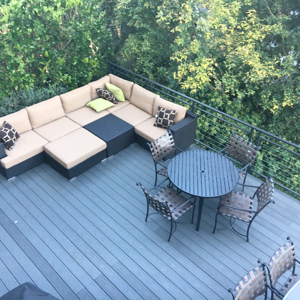 Deck - large transitional backyard deck idea in Seattle with no cover