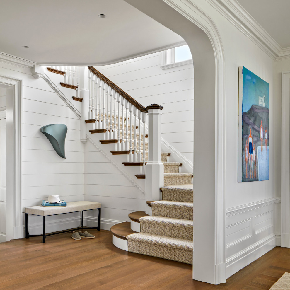 Staircase - coastal wooden wood railing and shiplap wall staircase idea in Providence with painted risers
