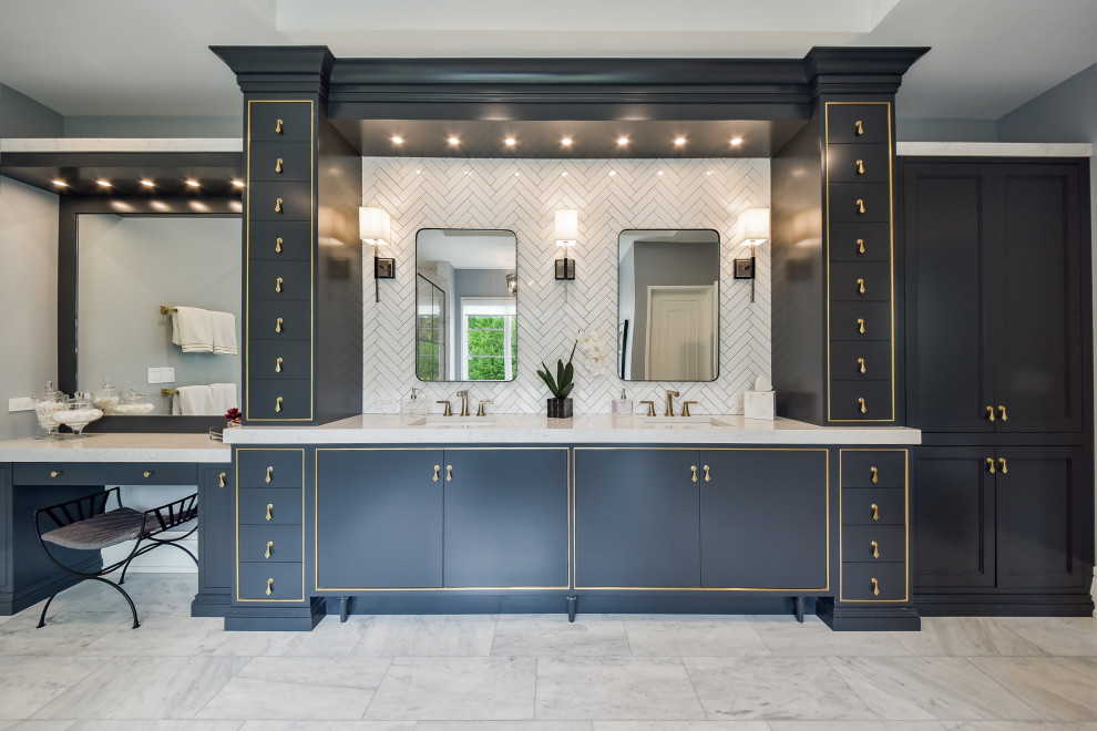 Large modern master bathroom in Chicago with flat-panel cabinets, blue cabinets, a freestanding tub, a corner shower, a two-piece toilet, beige tile, porcelain tile, blue walls, travertine floors, an undermount sink, quartzite benchtops, grey floor, a hinged shower door, white benchtops, an enclosed toilet, a double vanity, a built-in vanity and coffered.