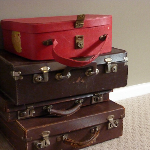 Suitcases as storage eclectic-bedroom