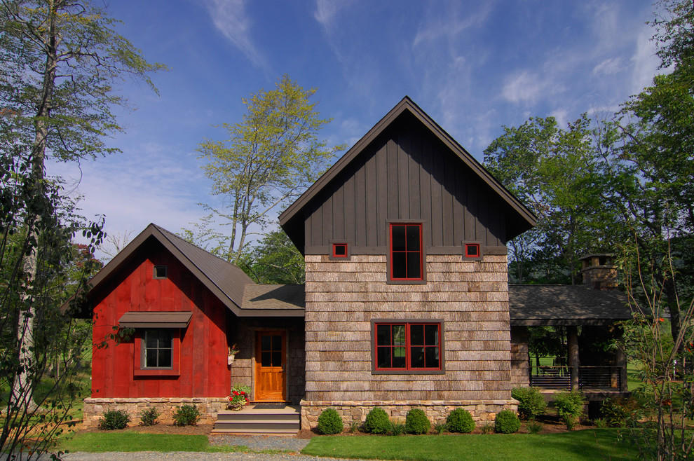 Inspiration for a country exterior in Charlotte with wood siding.