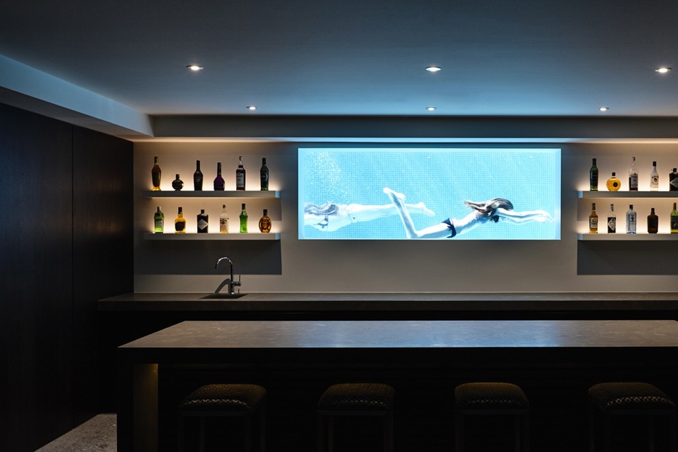 Design ideas for a contemporary home bar in Melbourne.