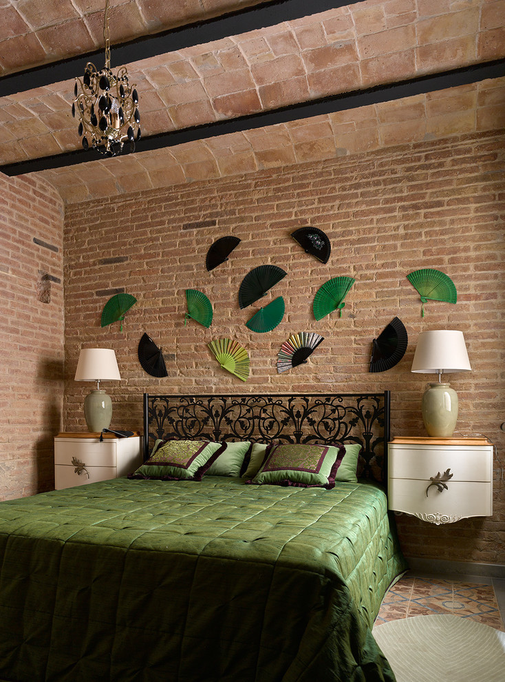 Photo of a mid-sized mediterranean master bedroom in Barcelona with brown walls, ceramic floors, no fireplace and brown floor.