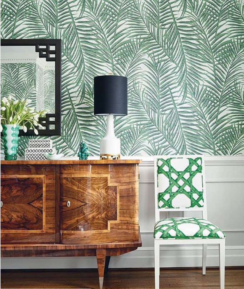 Example of an island style dark wood floor and brown floor dining room design with multicolored walls
