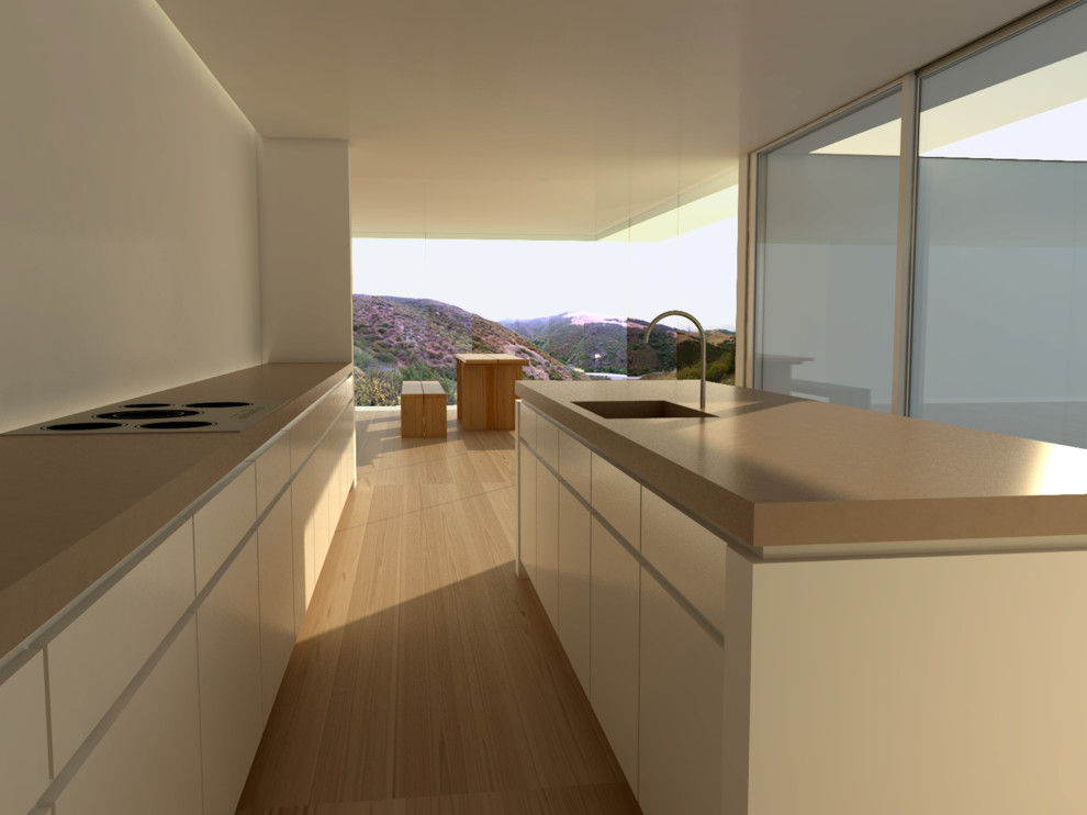 Design ideas for a mid-sized modern eat-in kitchen in San Luis Obispo with flat-panel cabinets, white cabinets, limestone benchtops, light hardwood floors, with island, an integrated sink and stainless steel appliances.