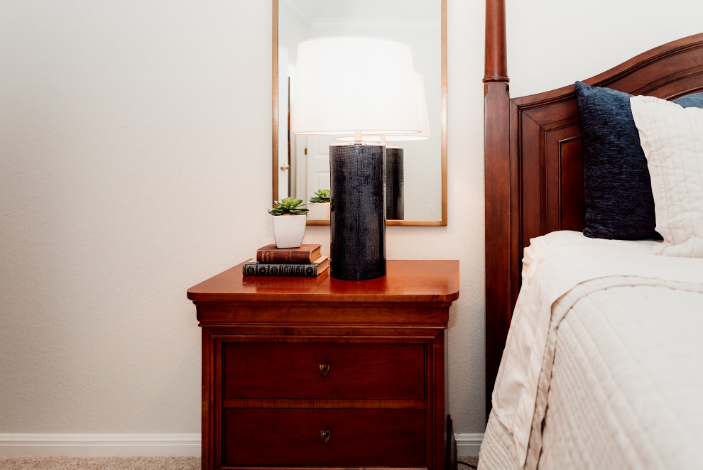 Transitional bedroom photo in Austin