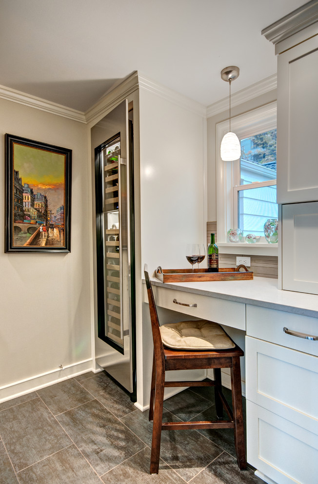 Example of a transitional kitchen design in Seattle