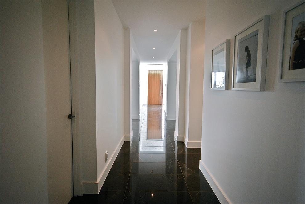 Design ideas for a contemporary hallway in Melbourne.