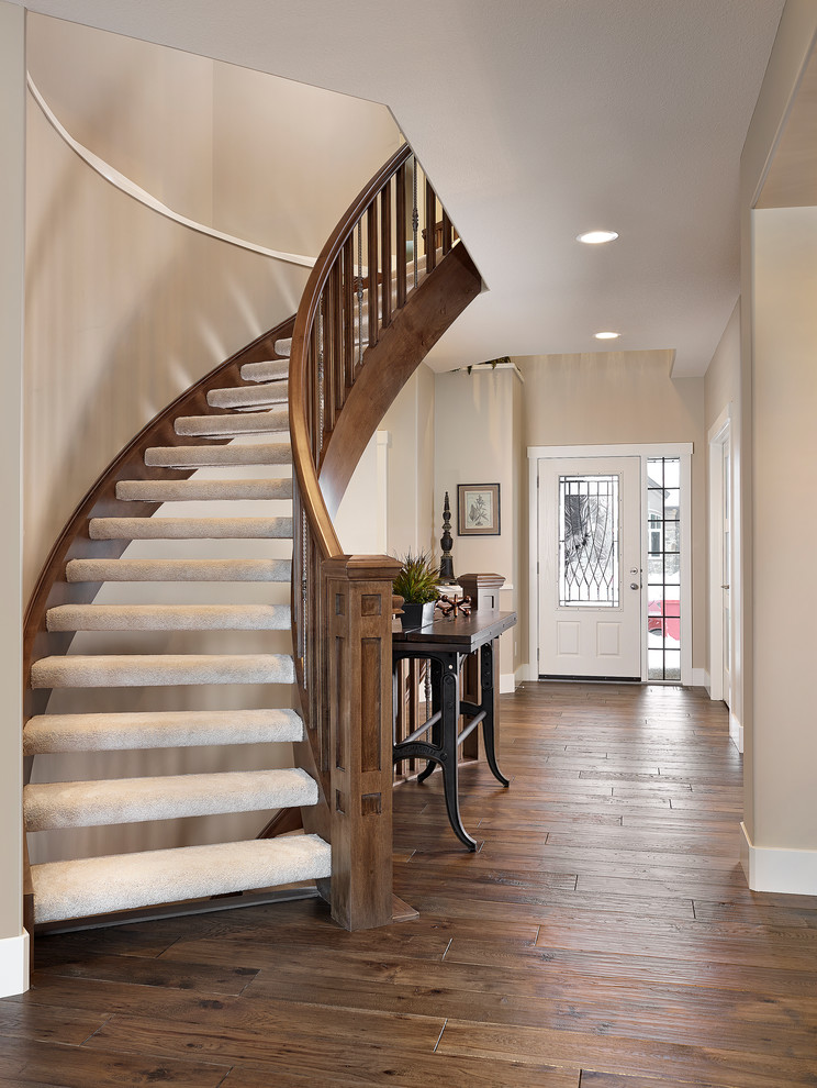 Inspiration for a transitional staircase in Edmonton with open risers.