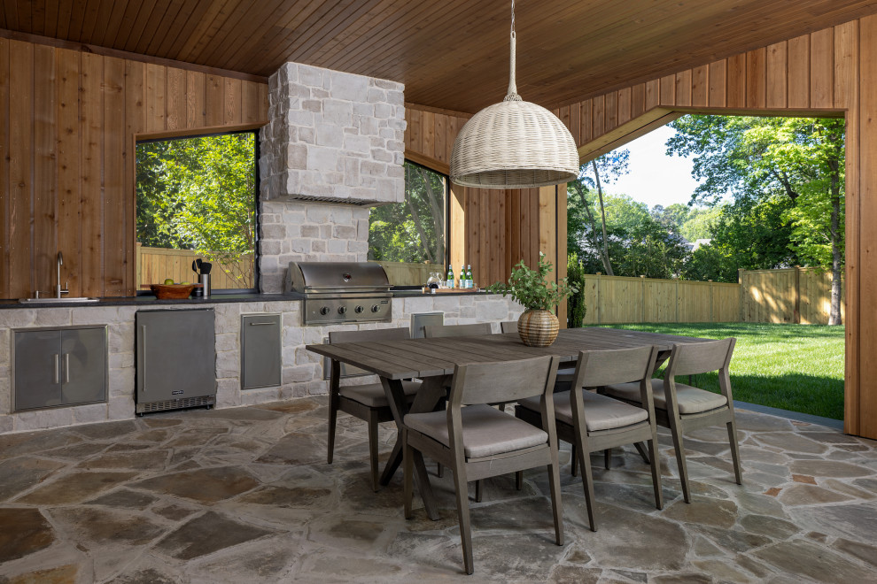 This is an example of a transitional porch design in Charlotte.
