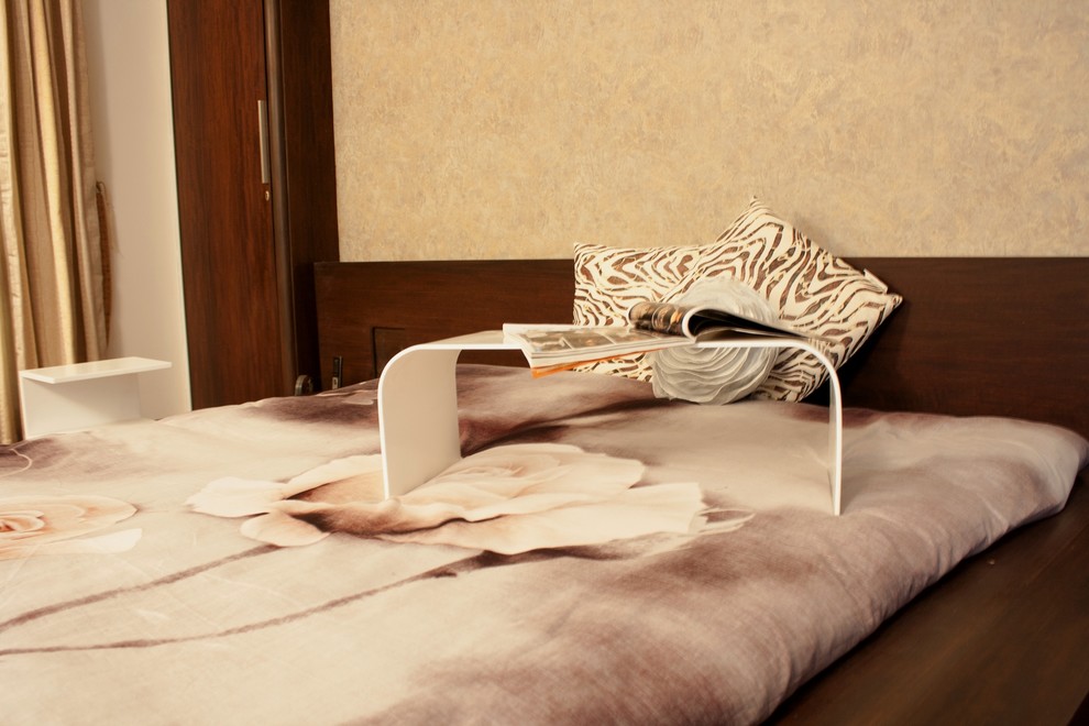 Example of a large trendy master dark wood floor bedroom design with white walls