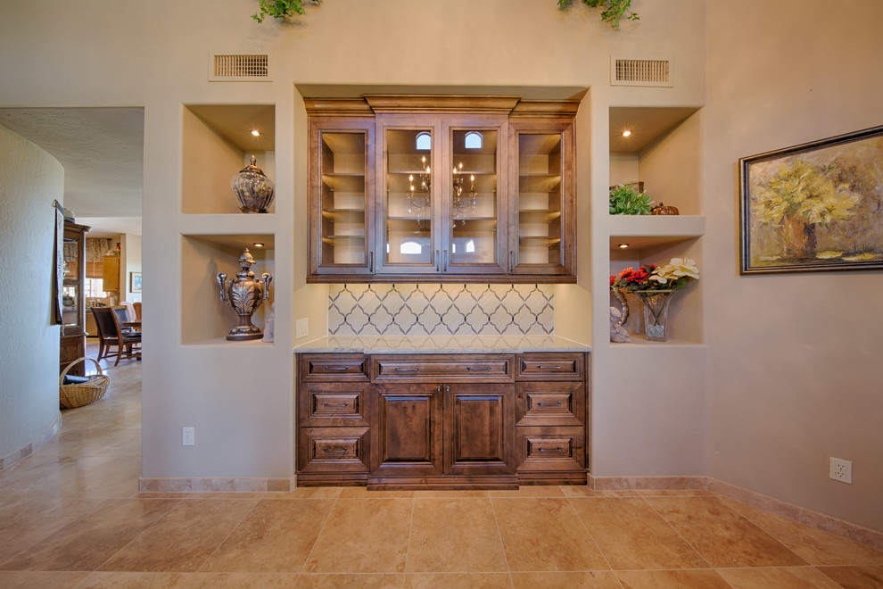 Example of a mid-sized transitional travertine floor and beige floor home design design in Phoenix with beige walls