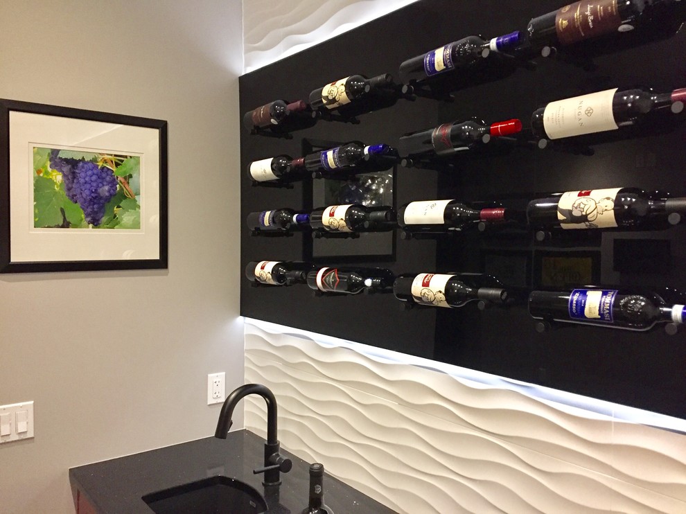 Example of a mid-sized trendy home design design in Calgary