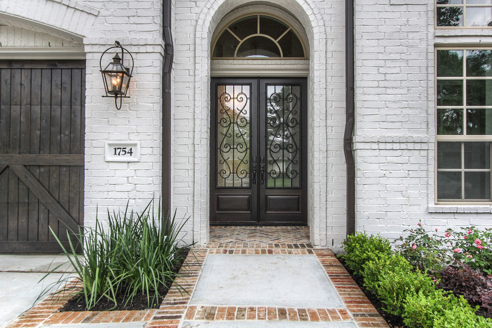 Transitional entryway photo in Houston