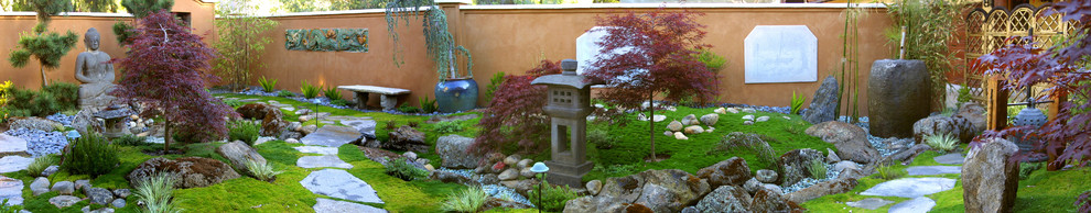 Photo of a mid-sized asian backyard formal garden in Santa Barbara.