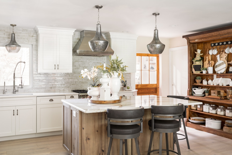 L-shaped kitchen photo with an island