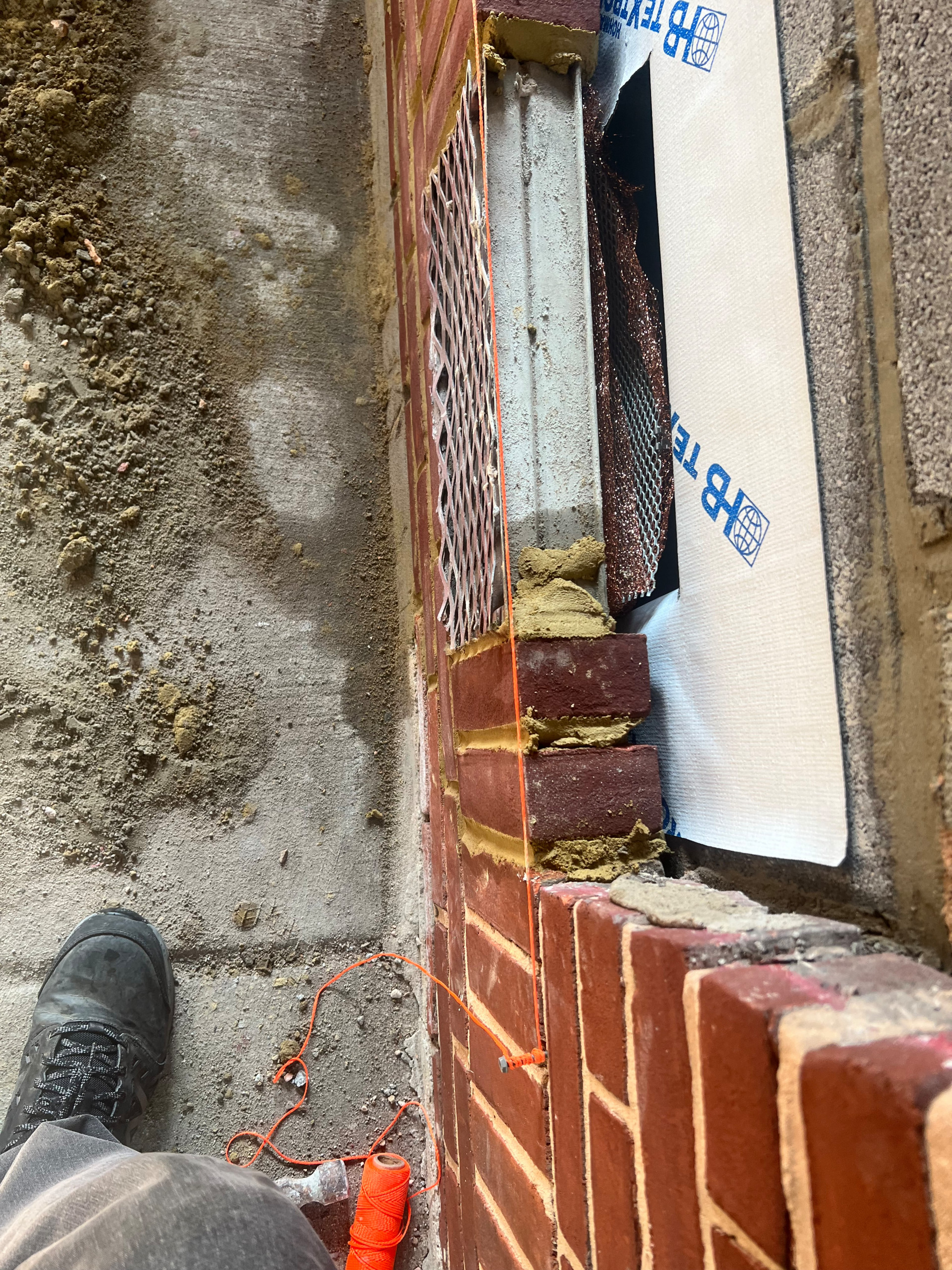 Historic wall panel and brick veneer replacement
