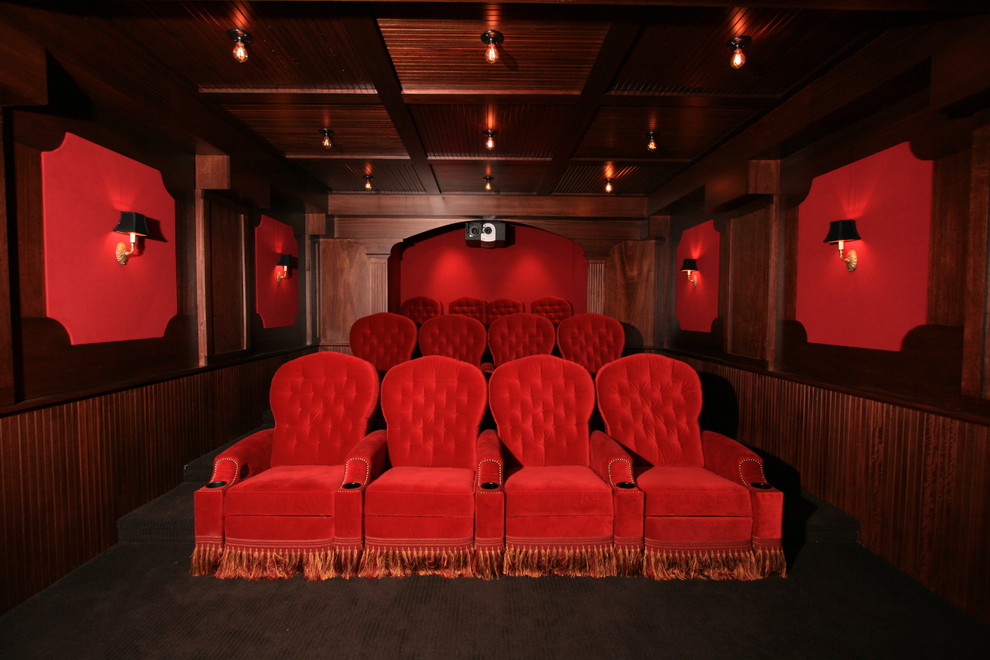 Design ideas for a traditional enclosed home theatre in New York with red walls.
