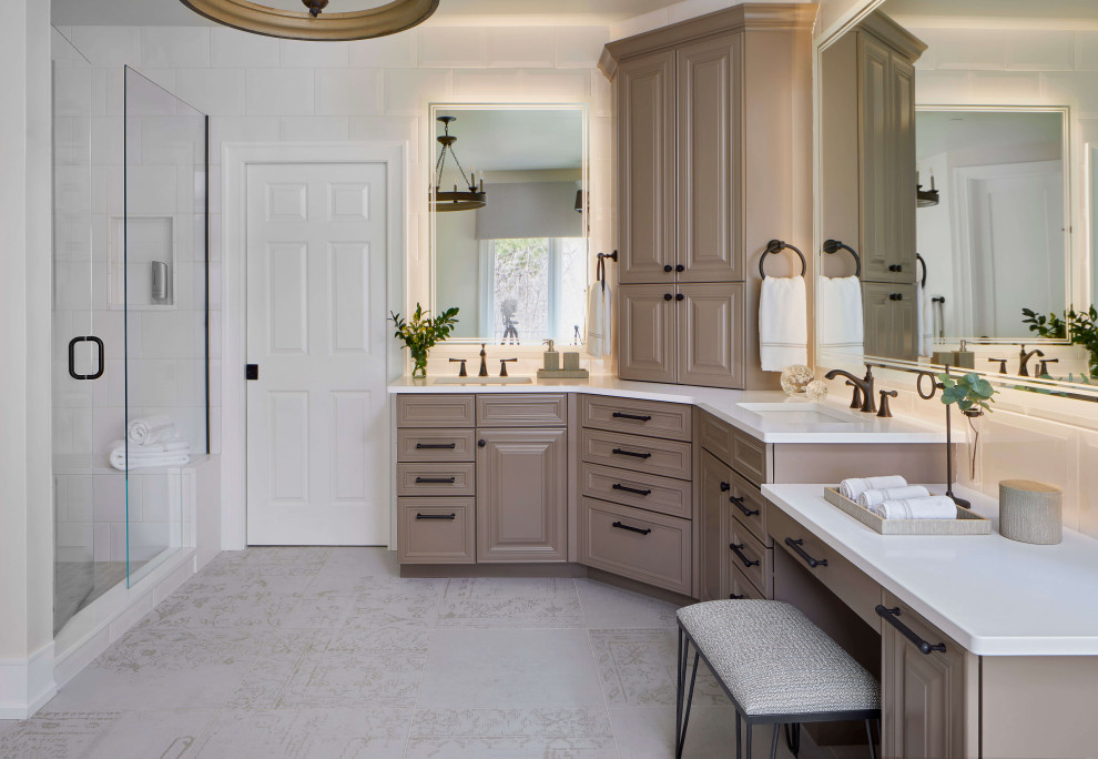 Design ideas for a large country master bathroom in Denver with raised-panel cabinets, light wood cabinets, an open shower, beige tile, beige walls, a drop-in sink, beige floor, a hinged shower door, white benchtops, a shower seat, a single vanity and a built-in vanity.