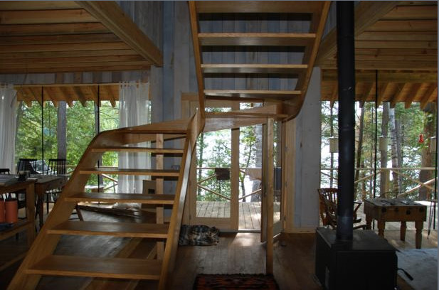 Example of a mid-sized mountain style entryway design in Ottawa