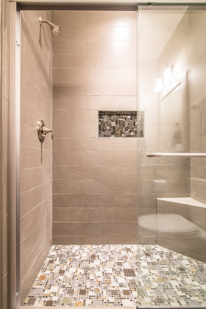 Design ideas for a mid-sized transitional 3/4 bathroom in DC Metro with raised-panel cabinets, white cabinets, an alcove shower, a two-piece toilet, gray tile, porcelain tile, beige walls, porcelain floors, an undermount sink, granite benchtops, grey floor and a sliding shower screen.