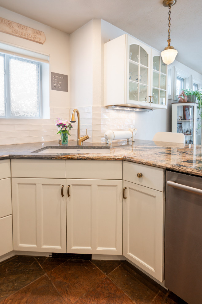 Example of a transitional kitchen design in Denver