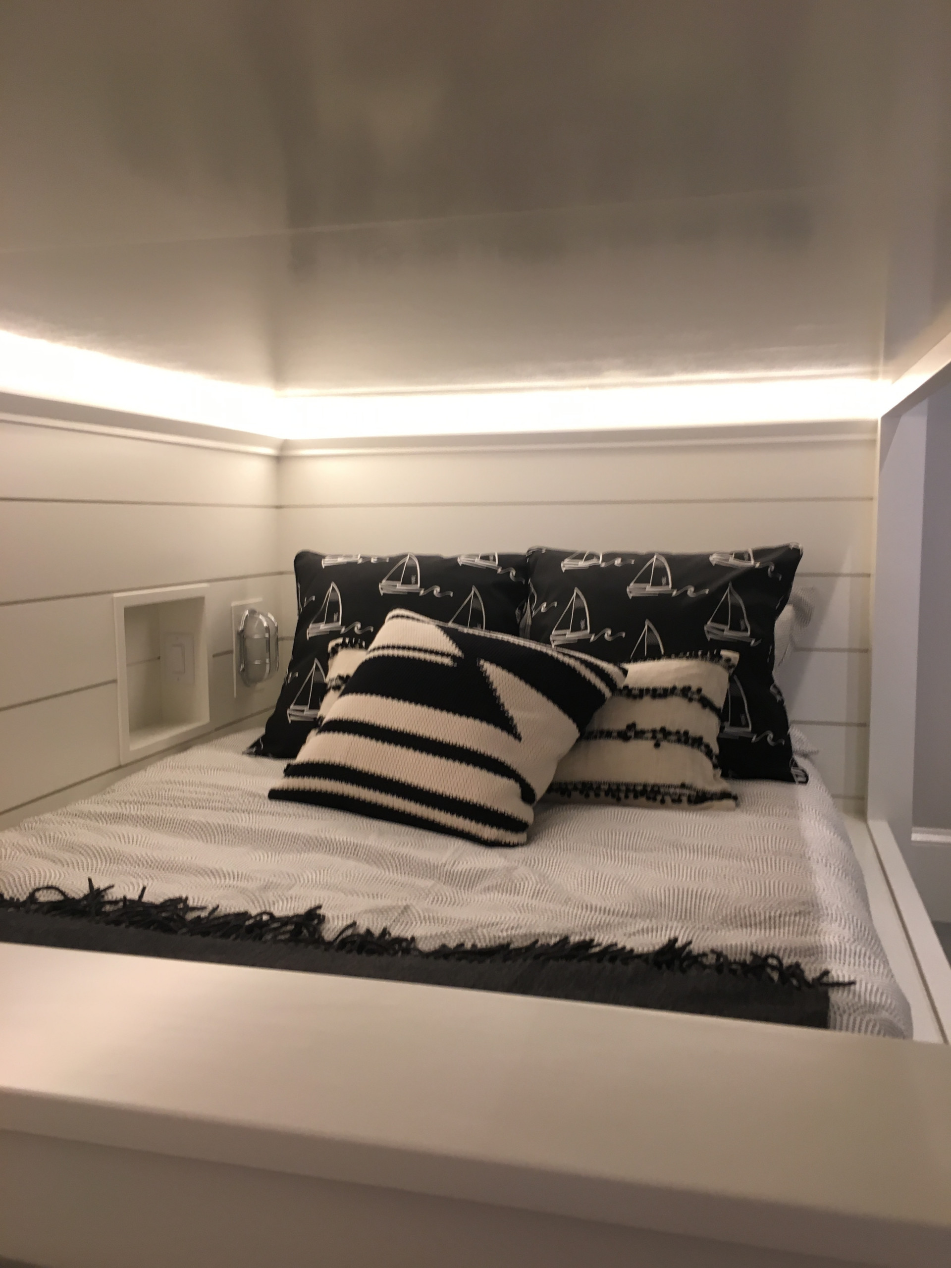 A fully equipped laundry room with a built ins