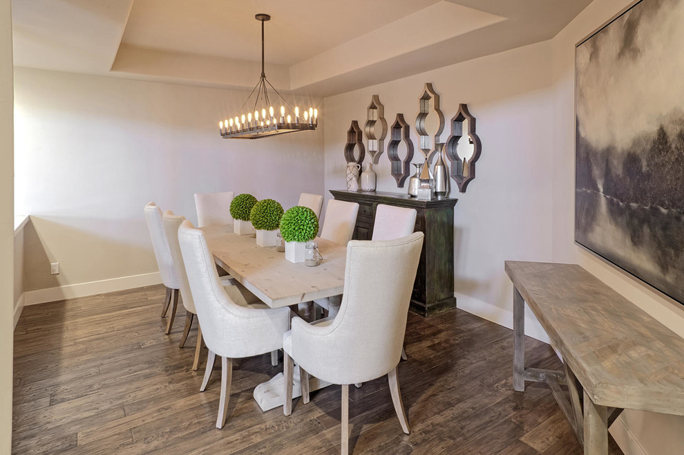 Photo of a mid-sized transitional separate dining room in Phoenix with beige walls, dark hardwood floors and no fireplace.