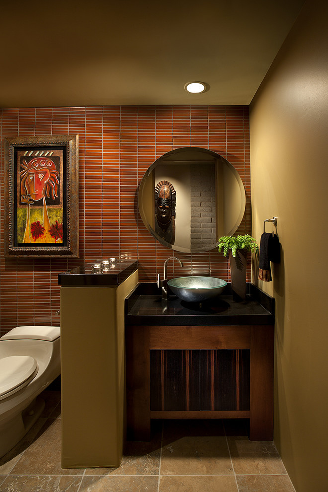 This is an example of a contemporary powder room in Phoenix with a vessel sink.