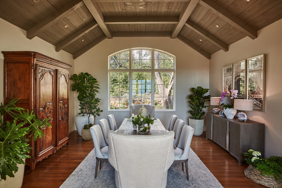 Large transitional separate dining room in Santa Barbara with beige walls and medium hardwood floors.