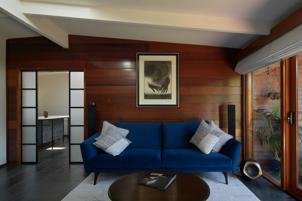 Esempio di un soggiorno minimalista con pavimento in ardesia