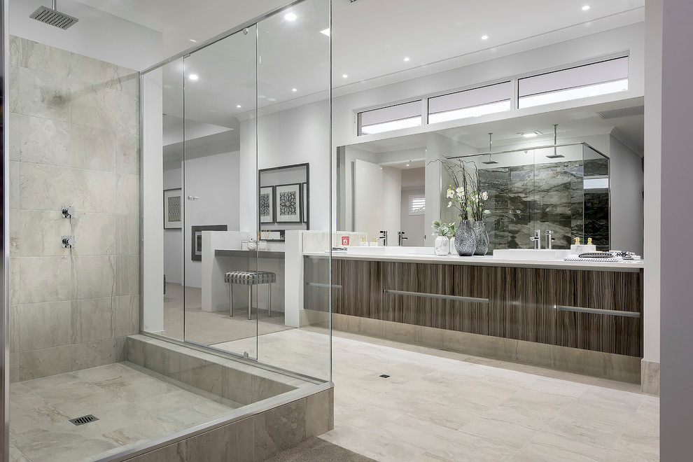 Photo of a large contemporary master bathroom in Perth with flat-panel cabinets, dark wood cabinets, a double shower, beige tile, stone tile, white walls, porcelain floors, a drop-in sink, engineered quartz benchtops and a sliding shower screen.
