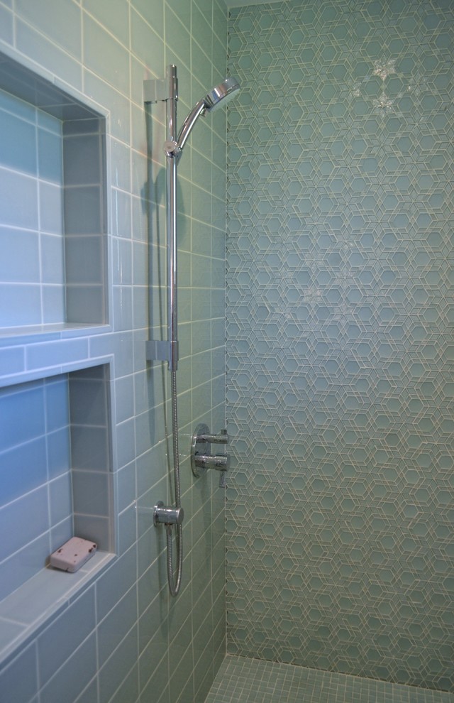 Inspiration for a mid-sized transitional 3/4 bathroom in San Francisco with flat-panel cabinets, medium wood cabinets, a double shower, blue tile, glass tile, concrete floors, an undermount sink, granite benchtops, green floor, a hinged shower door and multi-coloured benchtops.