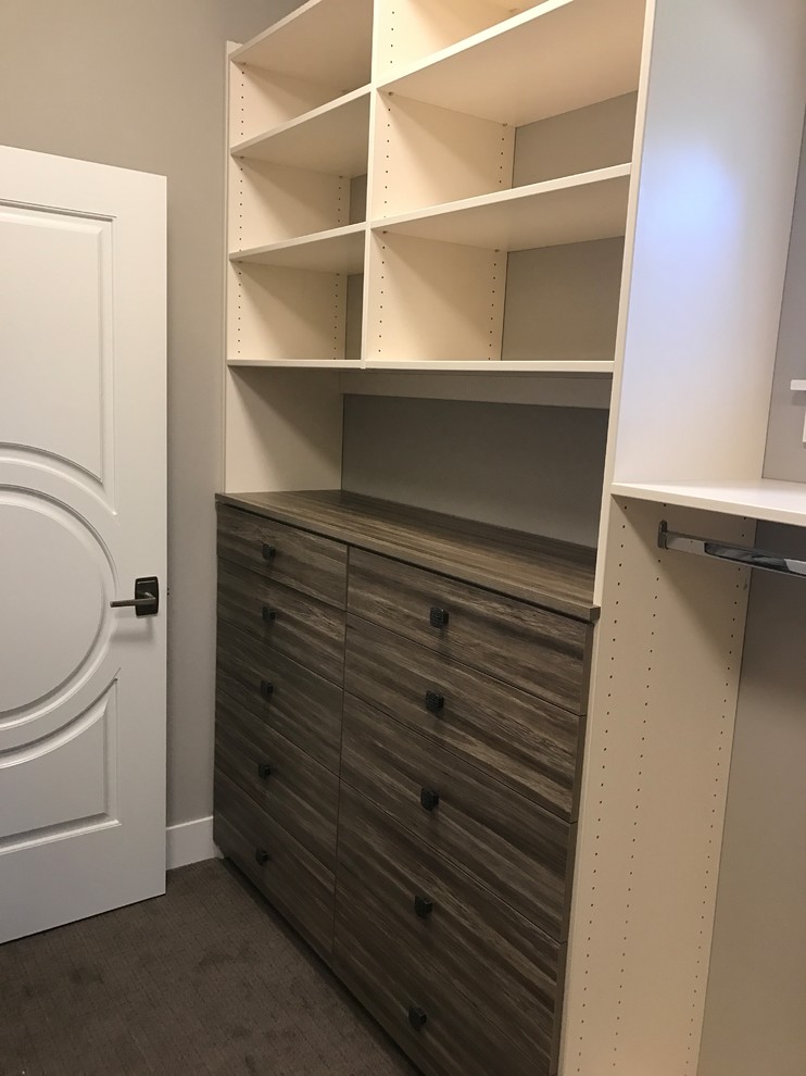 Example of a transitional closet design in Seattle