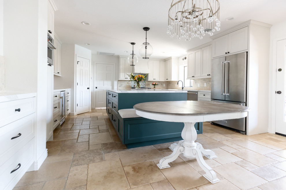 Design ideas for a large country u-shaped kitchen in Phoenix with a farmhouse sink, shaker cabinets, green cabinets, quartz benchtops, white splashback, brick splashback, stainless steel appliances, terrazzo floors, with island, beige floor and white benchtop.