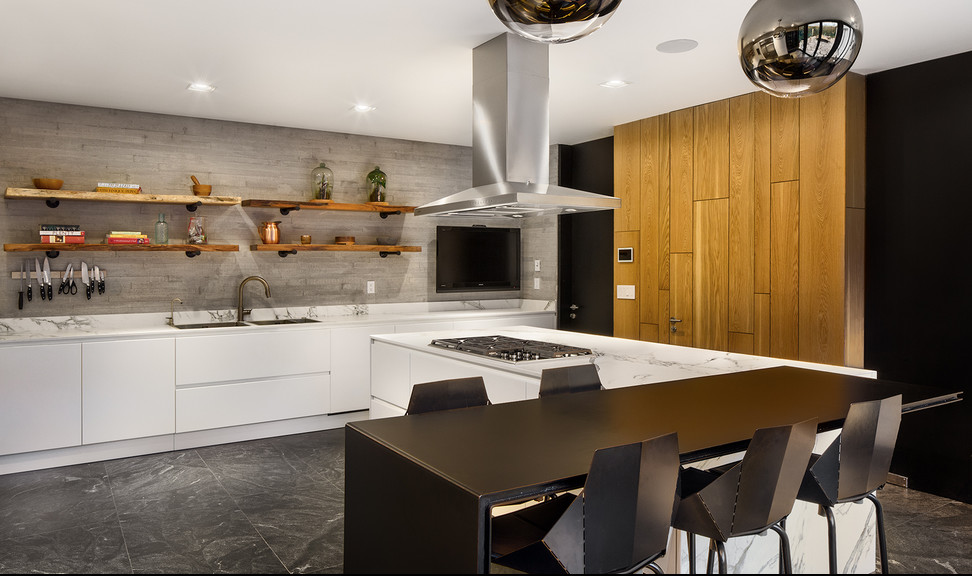 Photo of a large contemporary l-shaped open plan kitchen in Mexico City with a double-bowl sink, flat-panel cabinets, white cabinets, quartz benchtops, grey splashback, cement tile splashback, stainless steel appliances, ceramic floors and with island.