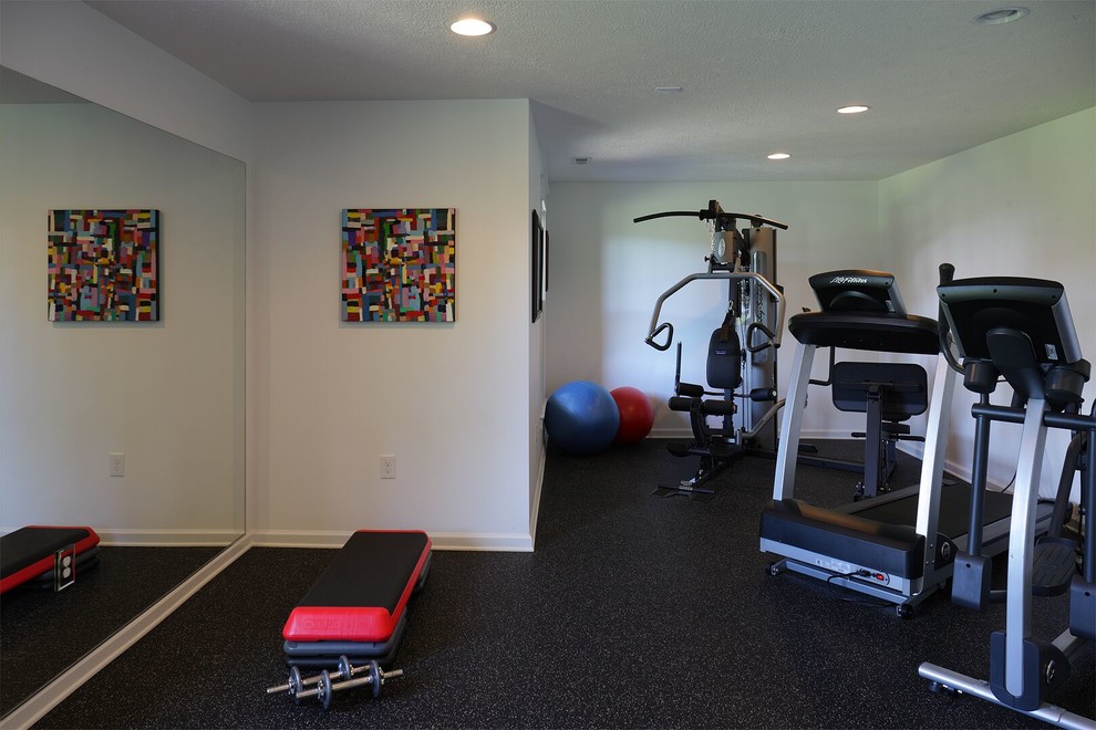 Design ideas for a large transitional multipurpose gym in Other with white walls.