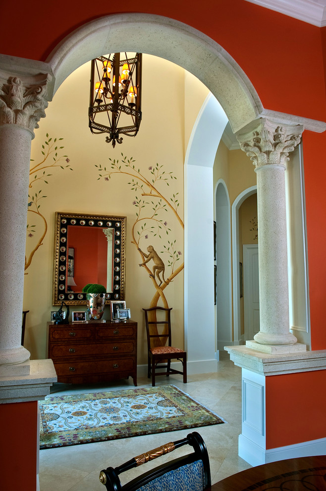 Photo of a traditional hallway in Miami with orange walls and white floor.
