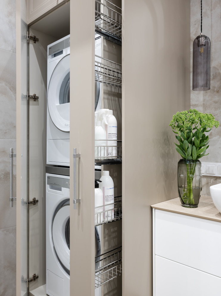 Laundry room - contemporary laundry room idea in Other