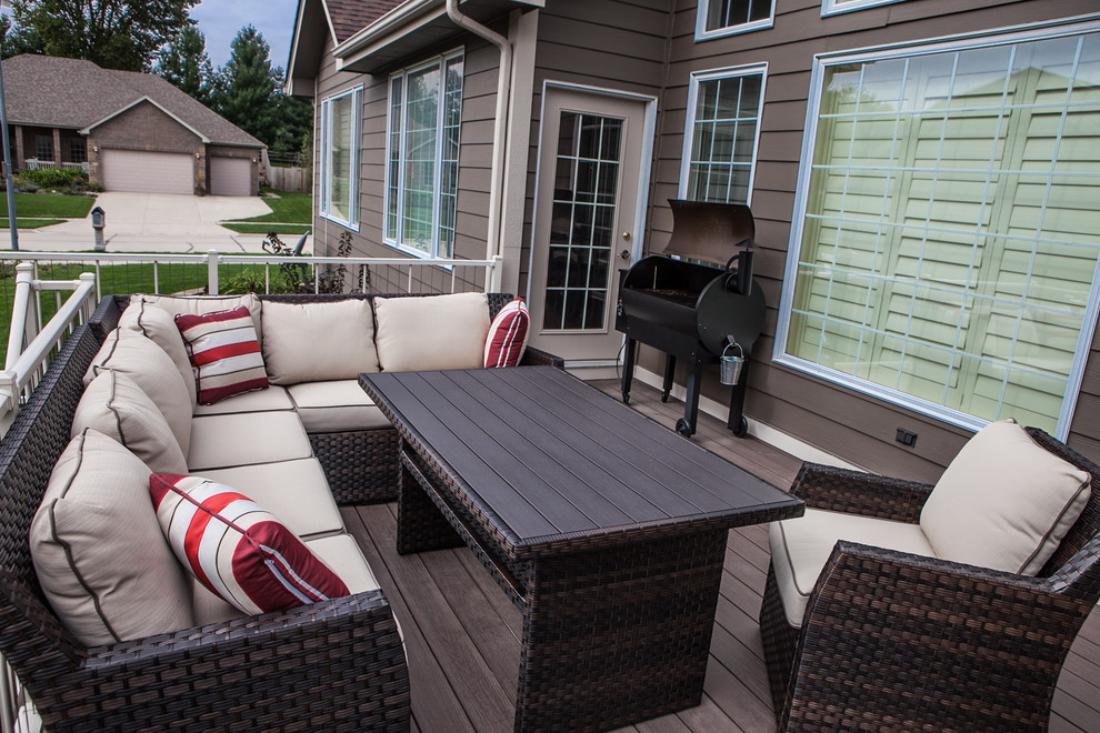 Deck - large traditional backyard deck idea with no cover