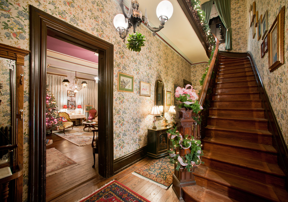 This is an example of a traditional wood curved staircase in Philadelphia with wood risers.