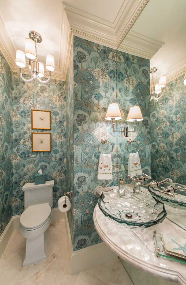 Photo of a small traditional powder room in DC Metro with a one-piece toilet, blue walls, porcelain floors, a vessel sink, quartzite benchtops and beige floor.