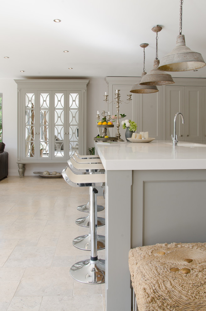 Transitional kitchen in Surrey with recessed-panel cabinets, grey cabinets and with island.