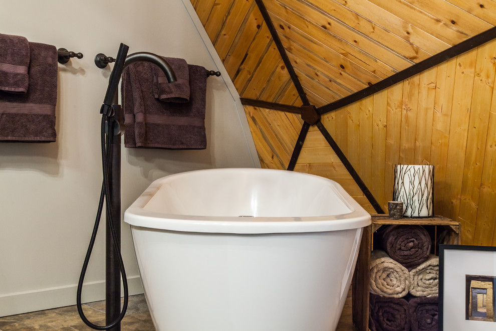 Freestanding bathtub - mid-sized rustic master multicolored tile and porcelain tile porcelain tile and multicolored floor freestanding bathtub idea with a vessel sink, shaker cabinets, quartz countertops, a one-piece toilet, gray walls and dark wood cabinets